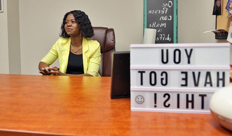 Frankline Tshombe sitting in her office at 家庭 First Counseling